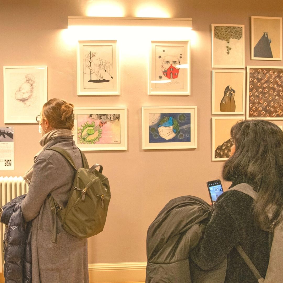 Gallery showing art by young artists regions of Syria and Yemen