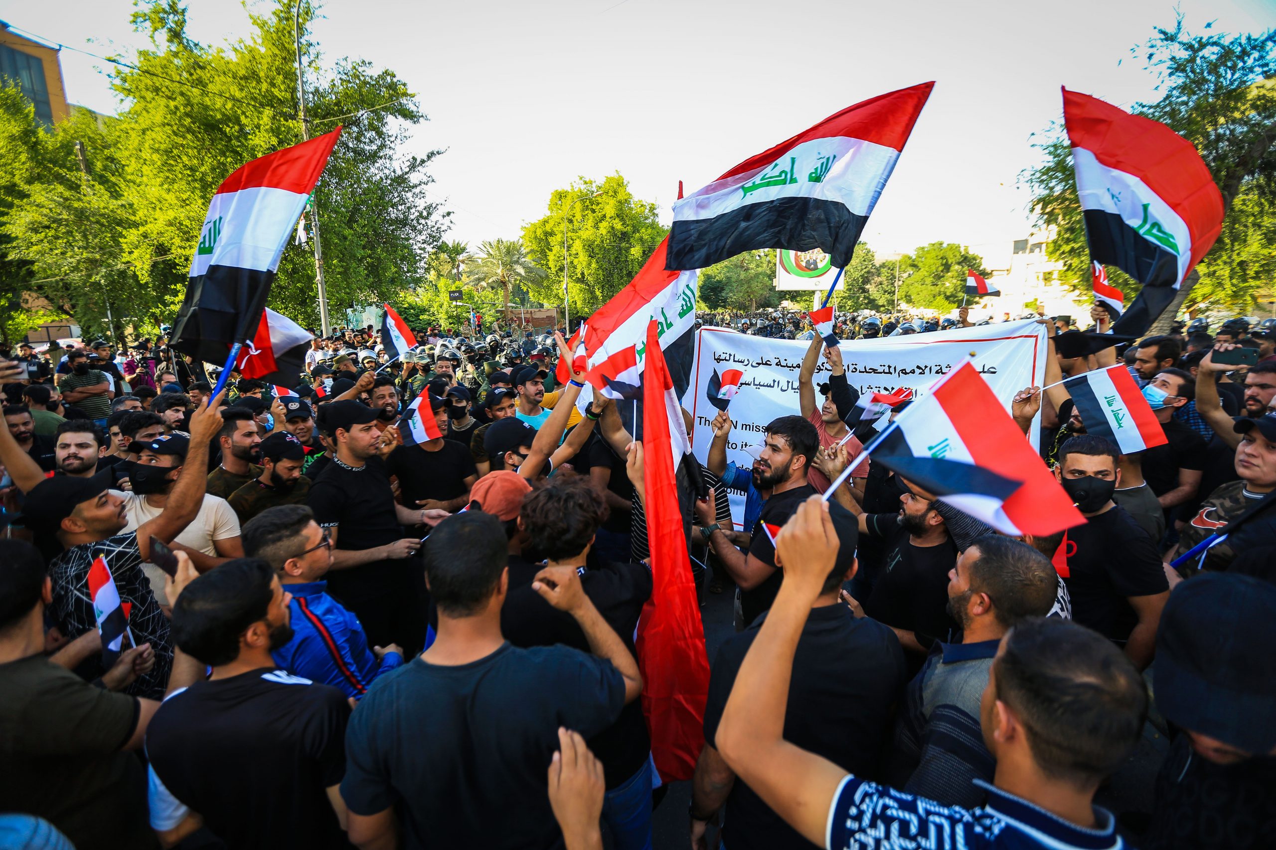 Iraqi protesters rally against the results of the Iraqi parliamentary election near Green Zone in Baghdad, Iraq on October 19, 2021.