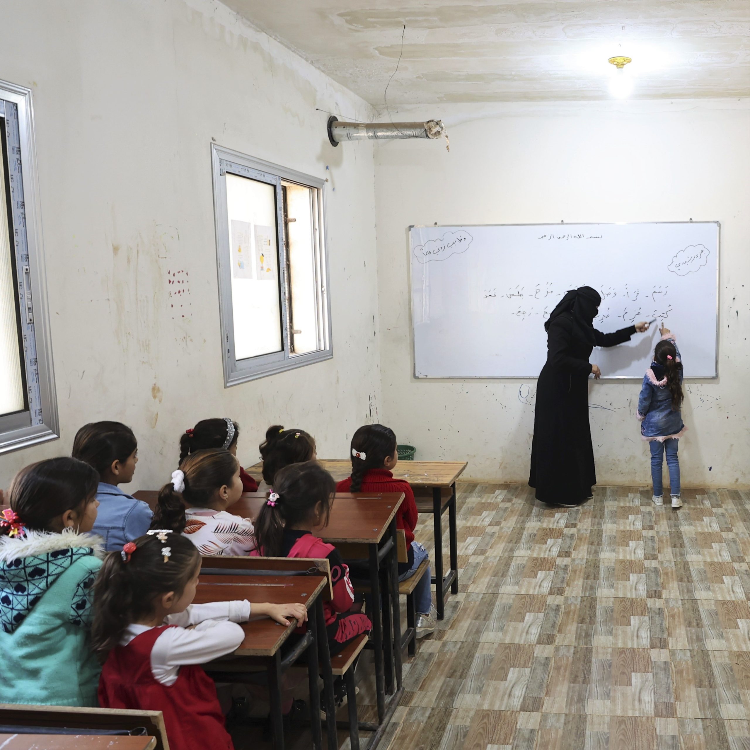Children attend a class for their fundamental education at Al-Ardiya Orphanage in Idlib, Syria in November 2021. (Photo by Dogukan Keskinkilic/Anadolu Agency via Getty Images)