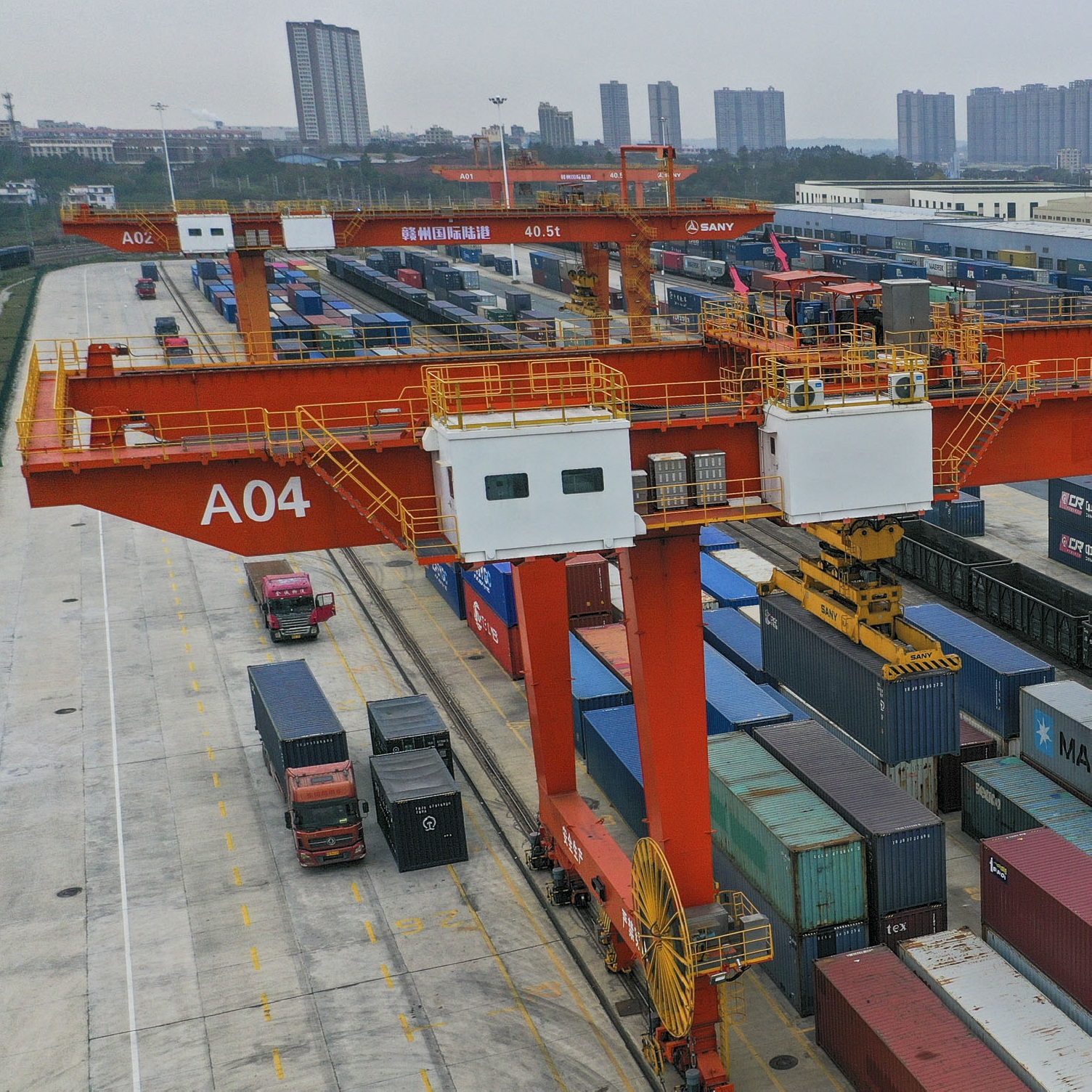 Aerial photo shows a Longmen crane loading and unloading containers at Ganzhou International Land Port in Ganzhou City, Jiangxi Province, China (December 2022). Photo credit: CFOTO/Future Publishing via Getty Images)