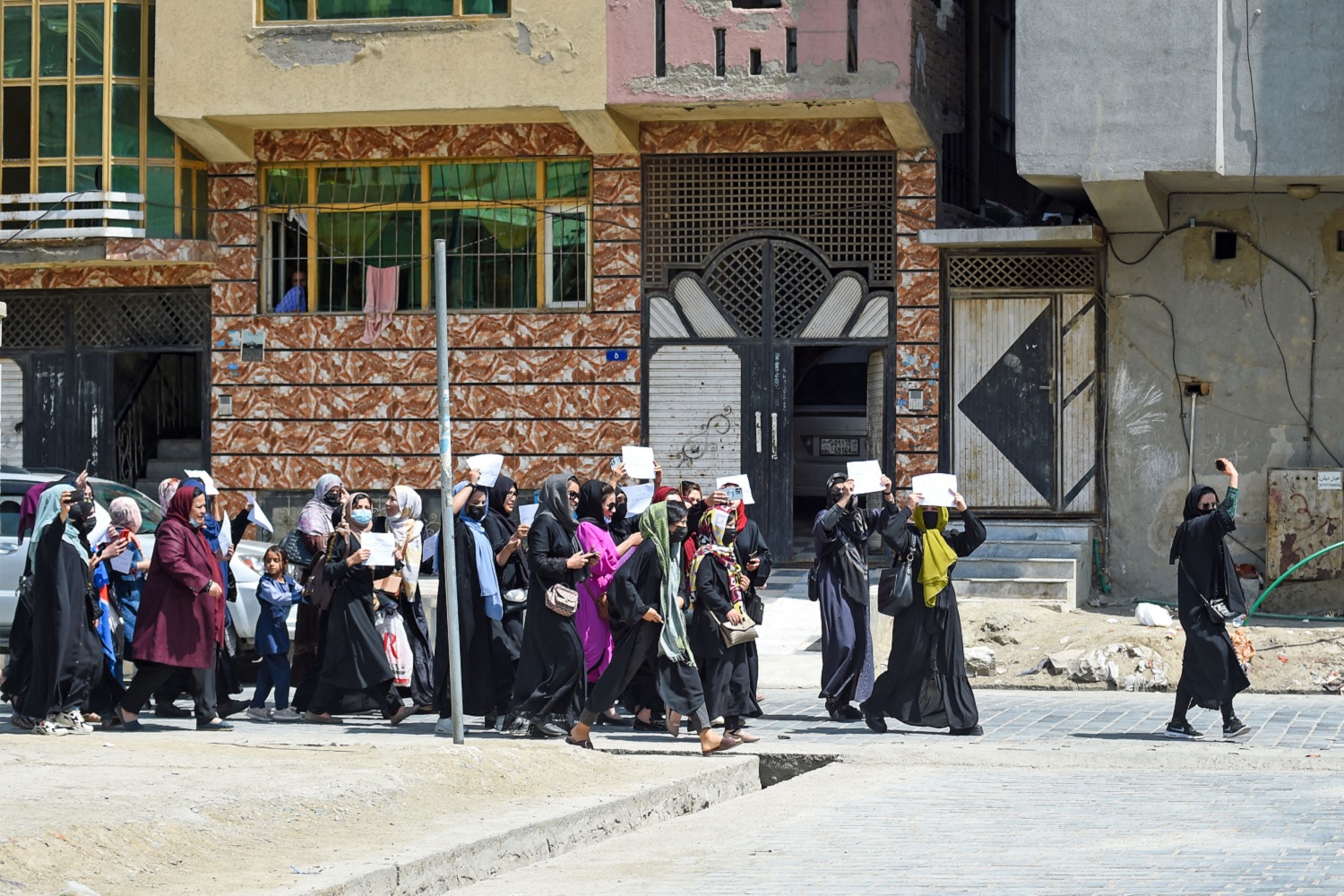 Afghan women hold placards as they march to protest for their rights in Kabul, Afghanistan (29 April 2023). Photo by AFP via Getty Images