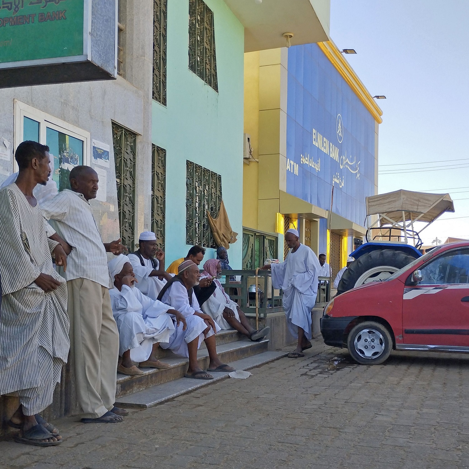 People queue outside a bank in Khartoum in May 2023 amid the ongoing conflict in Sudan.