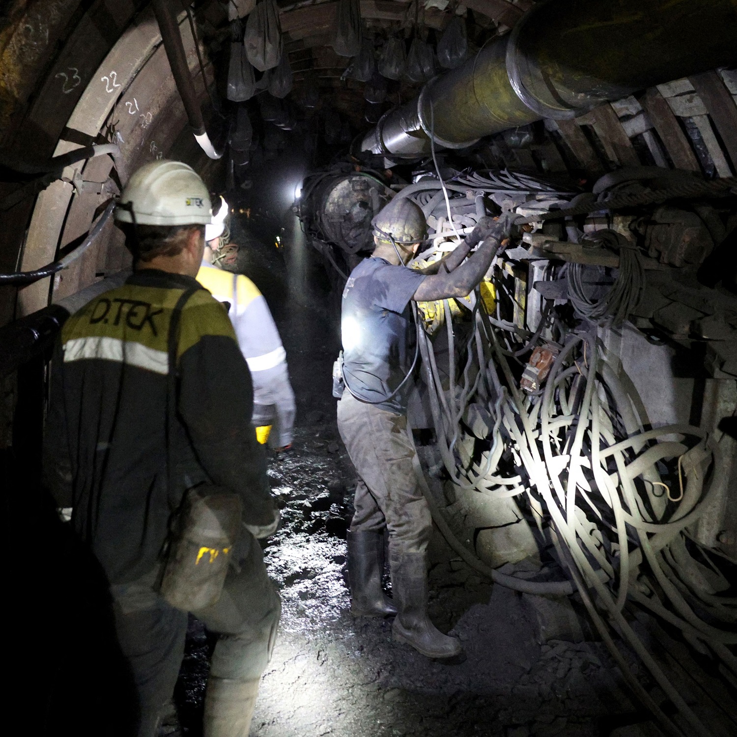 Miners work in one of the tunnels at a coal mine in the Dnipro region of Ukraine on June 9, 2023. Photo by Anatolii Stepanov / AFP