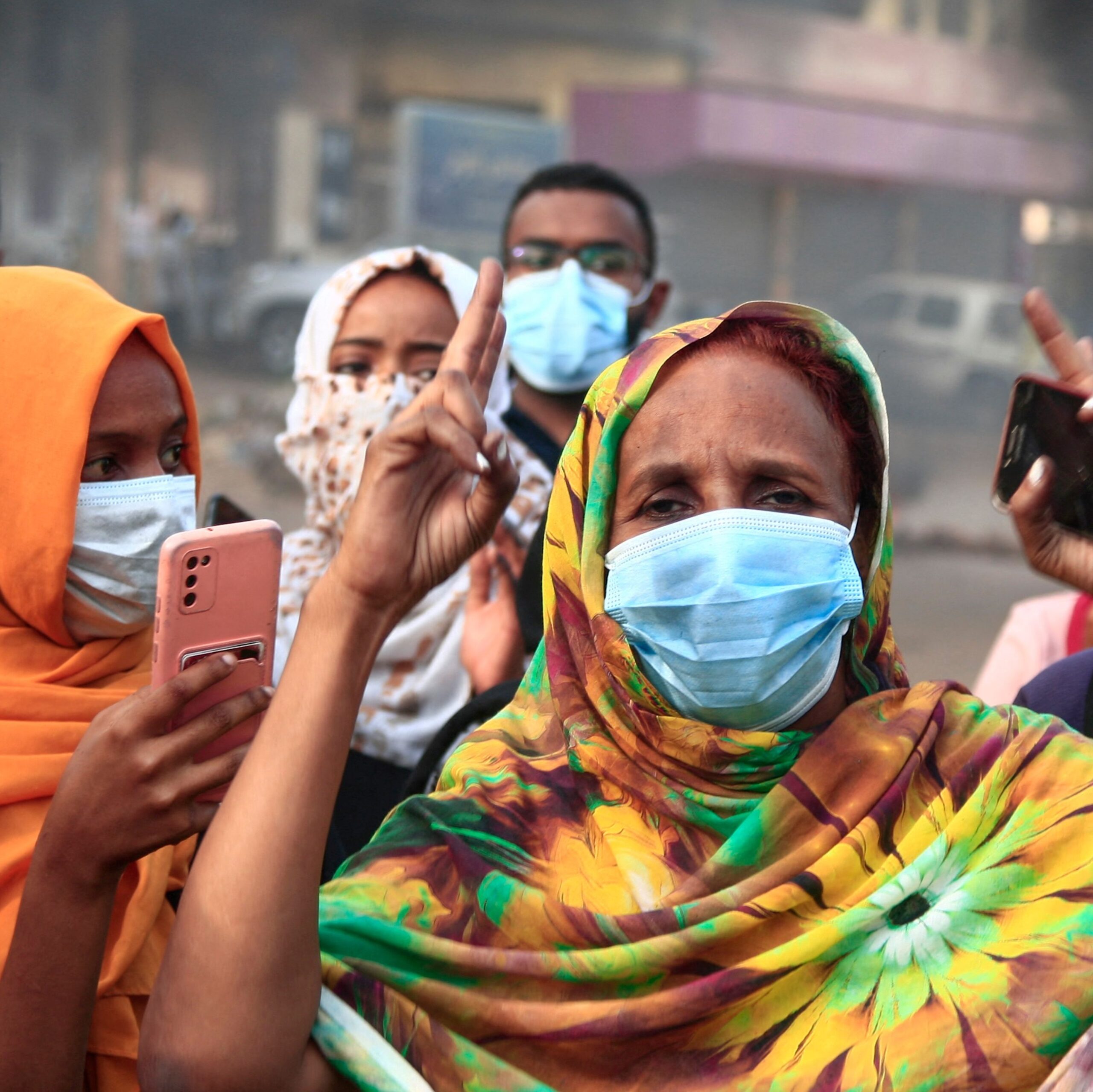 Sudanese protesters gesture during a demonstration in Khartoum, Sudan, on 25 October 2021