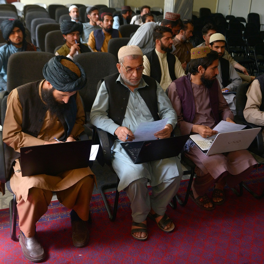 Members of the Taliban attend a computer science class at the Ministry of Transport and Civil Aviation in Kabul