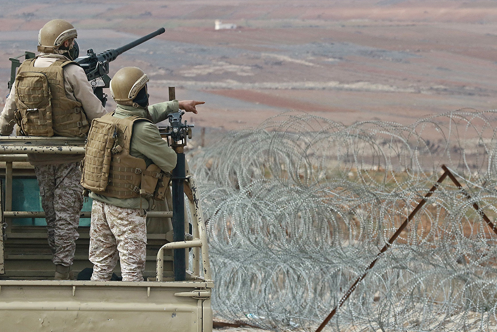 Jordanian Army soldiers patrolling along the border with Syria to prevent drug trafficking