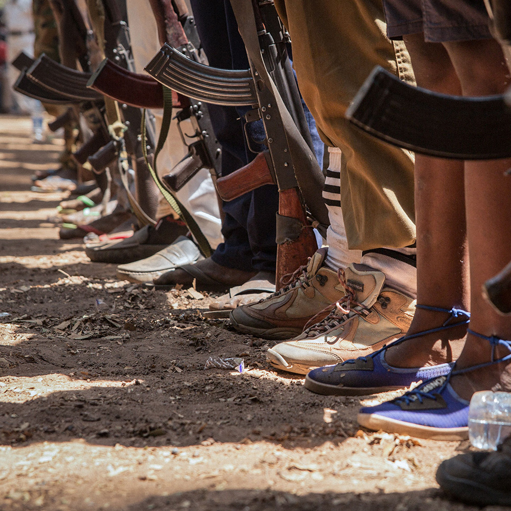 Child soldiers stand with rifles in South Sudan