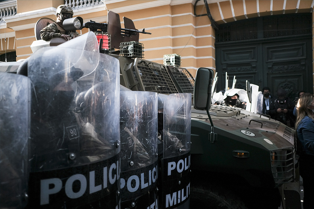 Military troops and an armored car pictured in La Paz, Bolivia